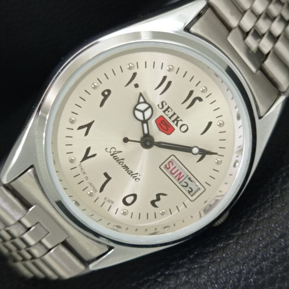 Vintage 1976 Seiko Automatic Mens Silver Watch W/daydate & Red accents